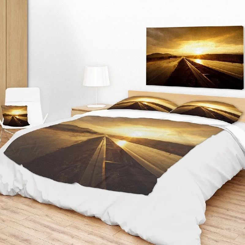 Premium reversible fleece throw blanket -Designart 'Wet After Rain Road at Sunset' Landscape Fleece Throw Blanket